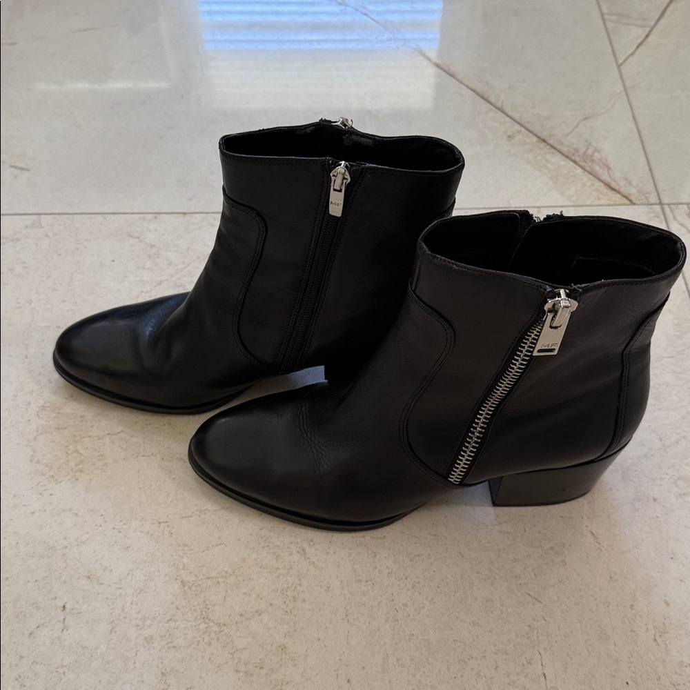 Marc Fisher Black Ankle Boots with Silver Accents. Leather upper.